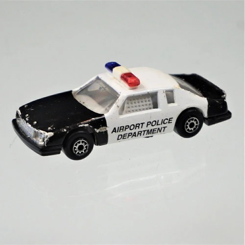Maisto Buick LeSabre Airport Police Car Diecast Toy 1/64 Scale Black White